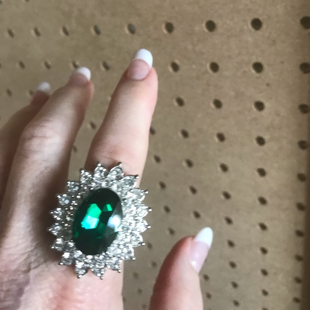 Large silver ring w/large emerald & rhinestones.